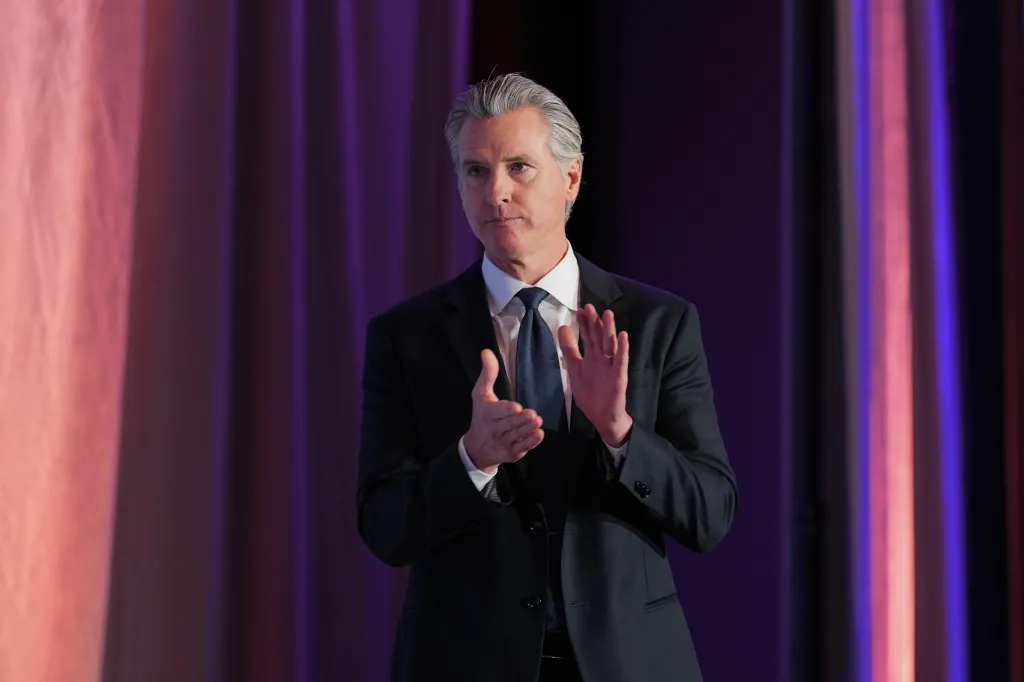 California Gov. Gavin Newsom clapping.