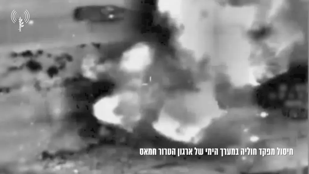 Black and white thermal image showing an explosion.