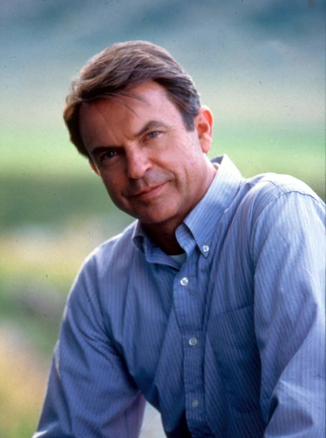Sam Neill in a blue striped shirt from "The Horse Whisperer" (1998).