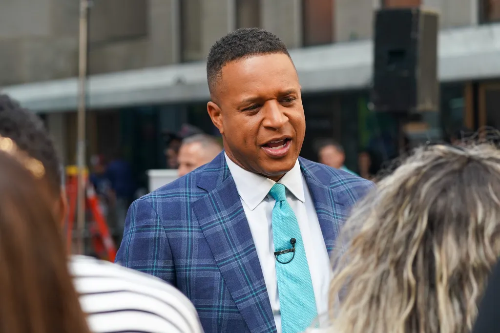 Craig Melvin, host of NBC's TODAY show, greets fans.