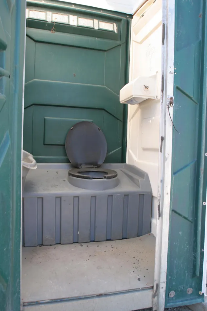 Interior of a porta-potty where Matthew Brown hid with guns.