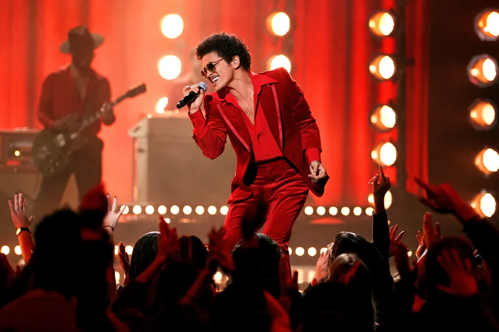 The journalist also accepted four tickets from the county corporation to attend the Bruno Mars concert on April 17.