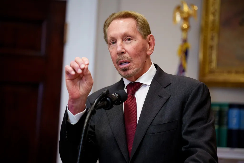 Larry Ellison speaking at a news conference in the White House.