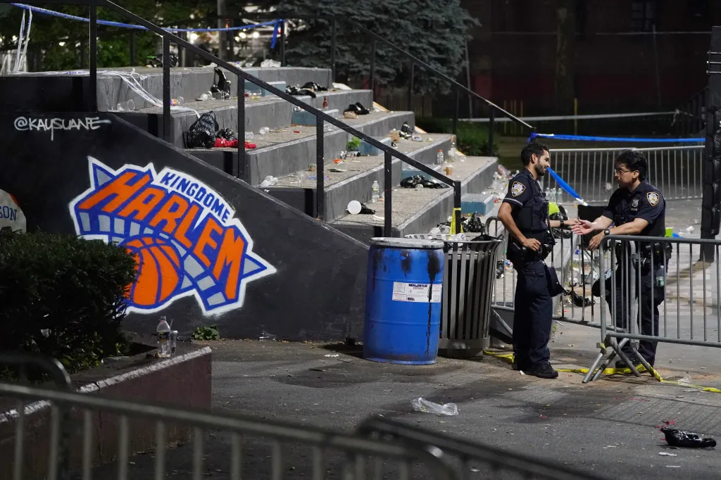Police investigate a triple shooting on a basketball court where one person died.