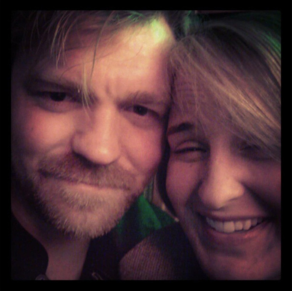 Close-up of Lyndsey Fifield smiling next to Graham Platner.