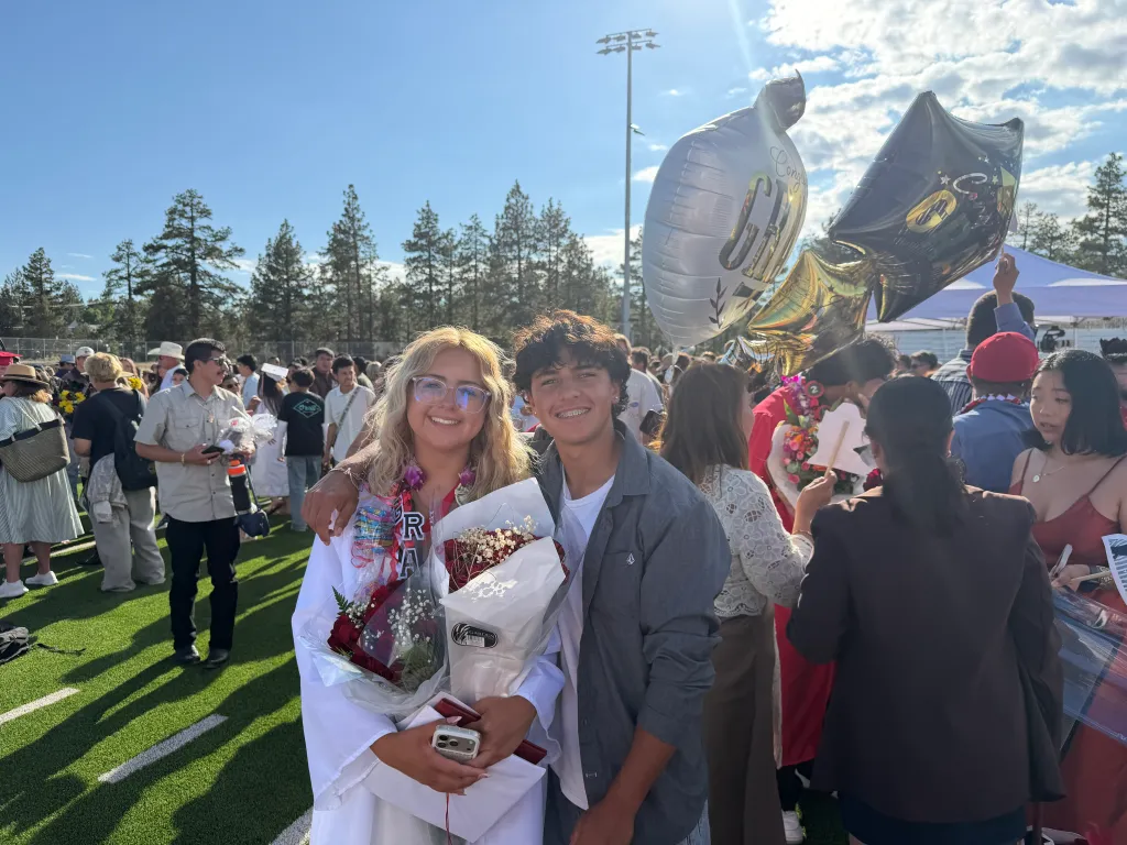 Isabella Fanueler on the left with her brother Alex at her high school graduation.