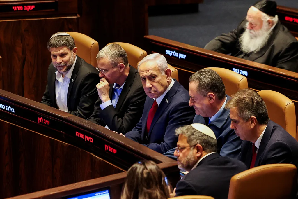 Israeli Prime Minister Benjamin Netanyahu and other government officials attend a discussion in the Knesset.