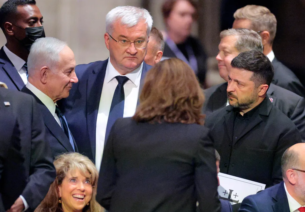 Israeli Prime Minister Benjamin Netanyahu, Ukrainian Foreign Minister Andrii Sybiha, and Ukraine President Volodymyr Zelensky attend a funeral service.