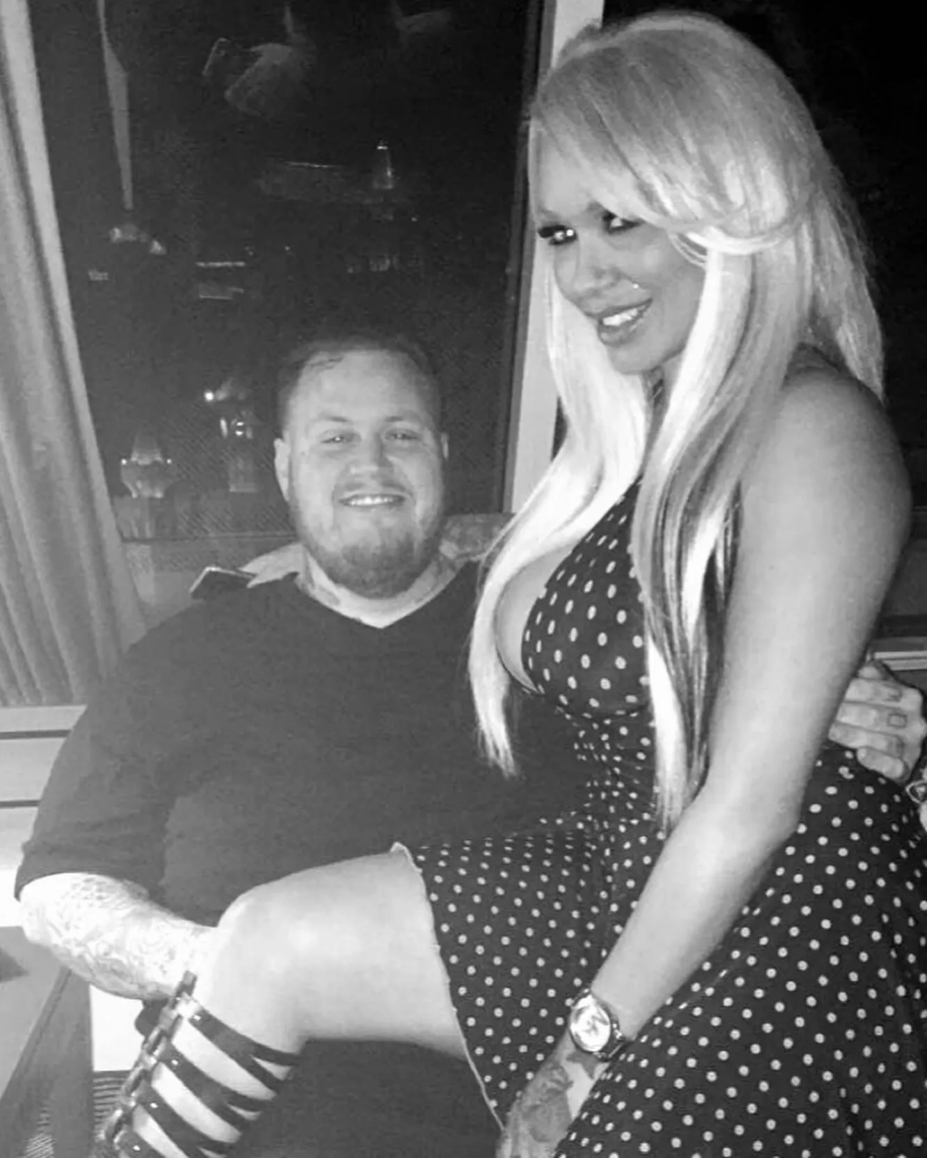 Jelly Roll and Bunnie Xo smiling while celebrating 10 years together.