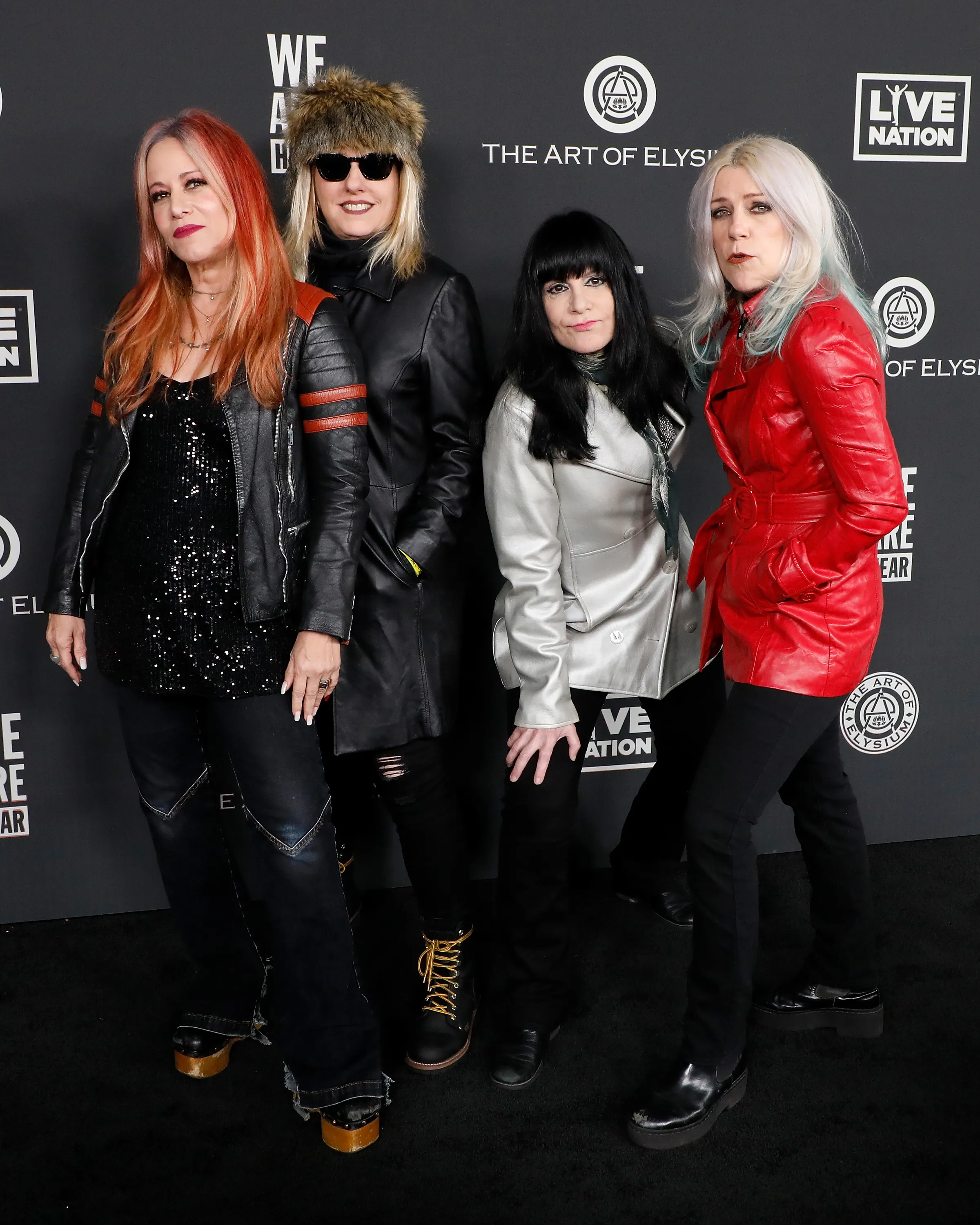 Jennifer Finch, Suzi Gardner, Demetra Plakas, and Donita Sparks of L7 pose together at The Art of Elysium's 13th Annual Heaven Gala.