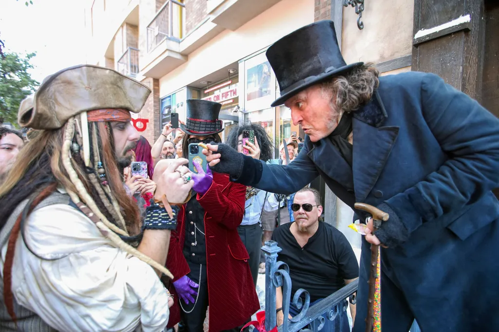 Johnny Depp as Ebenezer Scrooge interacts with fans at San Diego Comic-Con.