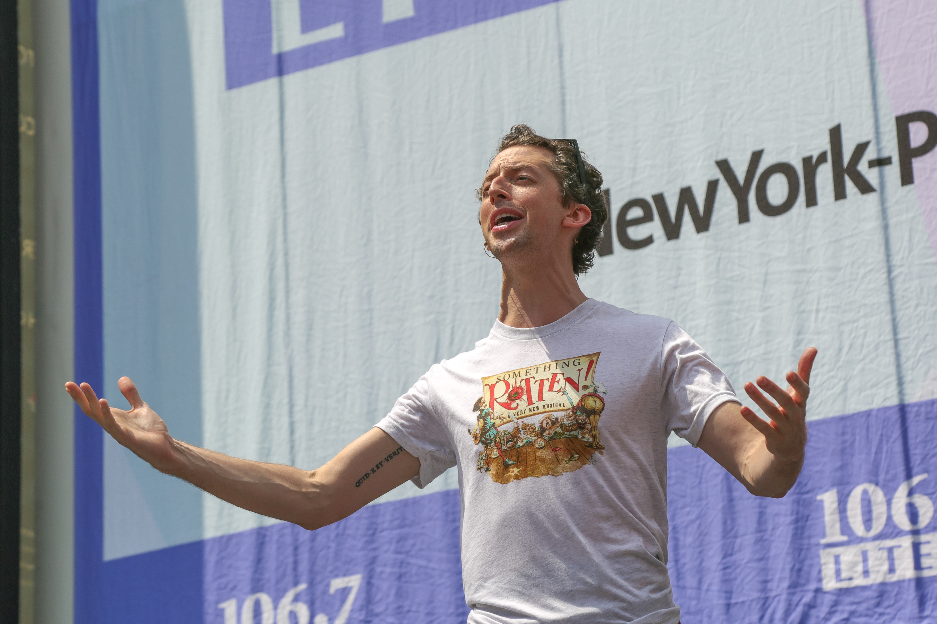 Josh Grisetti from "Something Rotten" performing on stage.