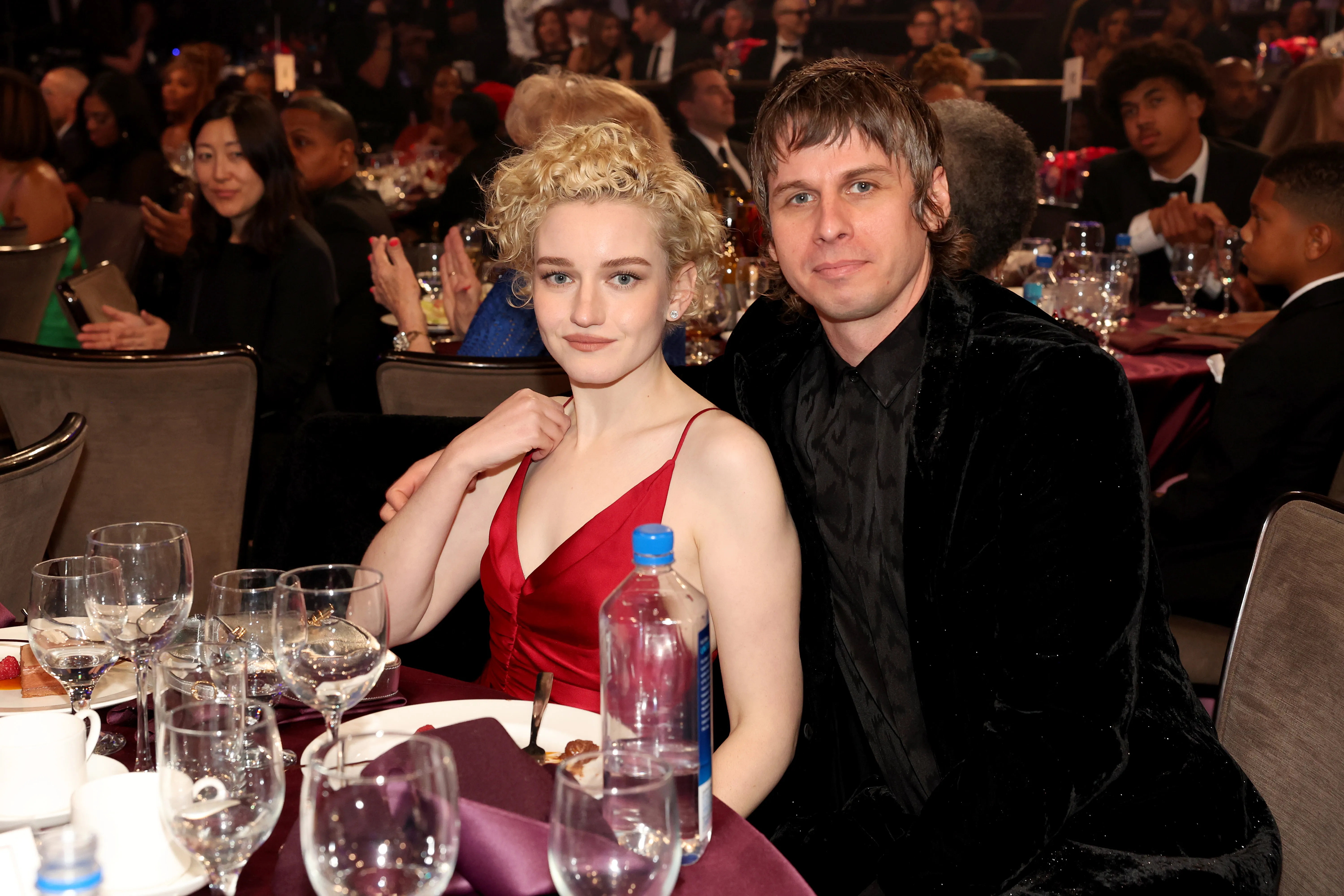 Julia Garner and Mark Foster attend the Pre-GRAMMY Gala.