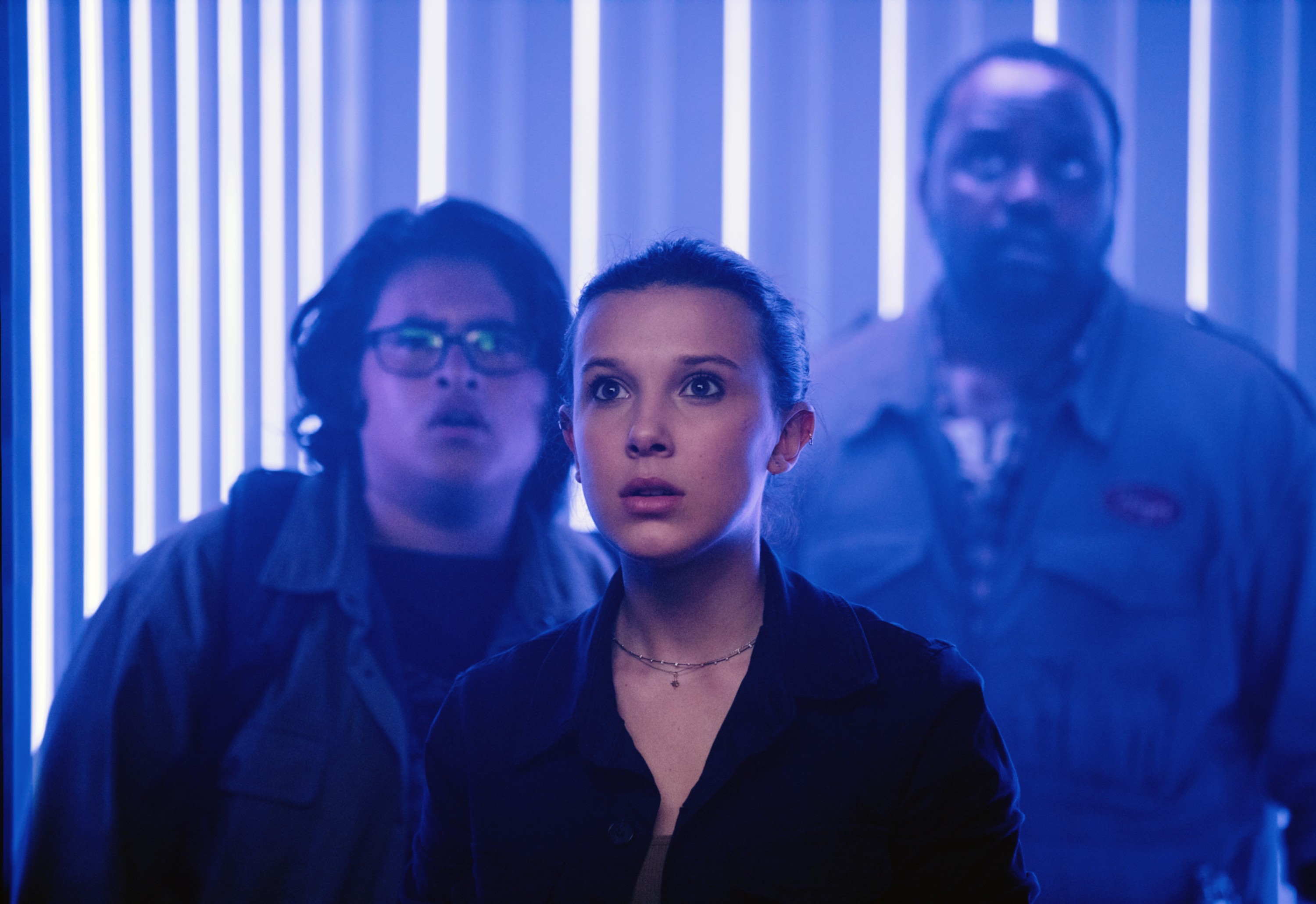 From left, Julian Dennison, Millie Bobby Brown, and Brian Tyree Henry in "Godzilla vs. Kong."
