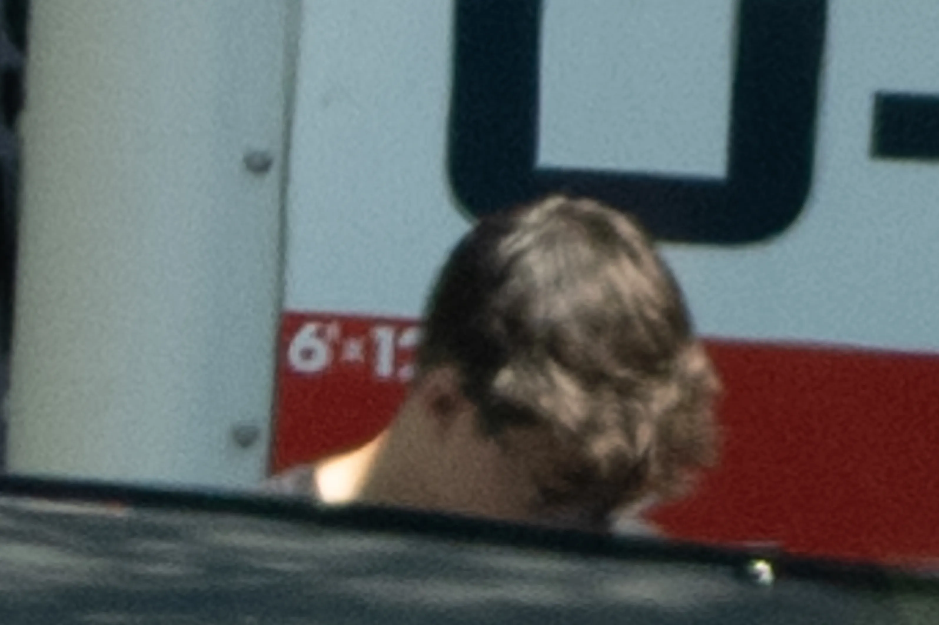 Aaden Gosselin loading items into a U-Haul.