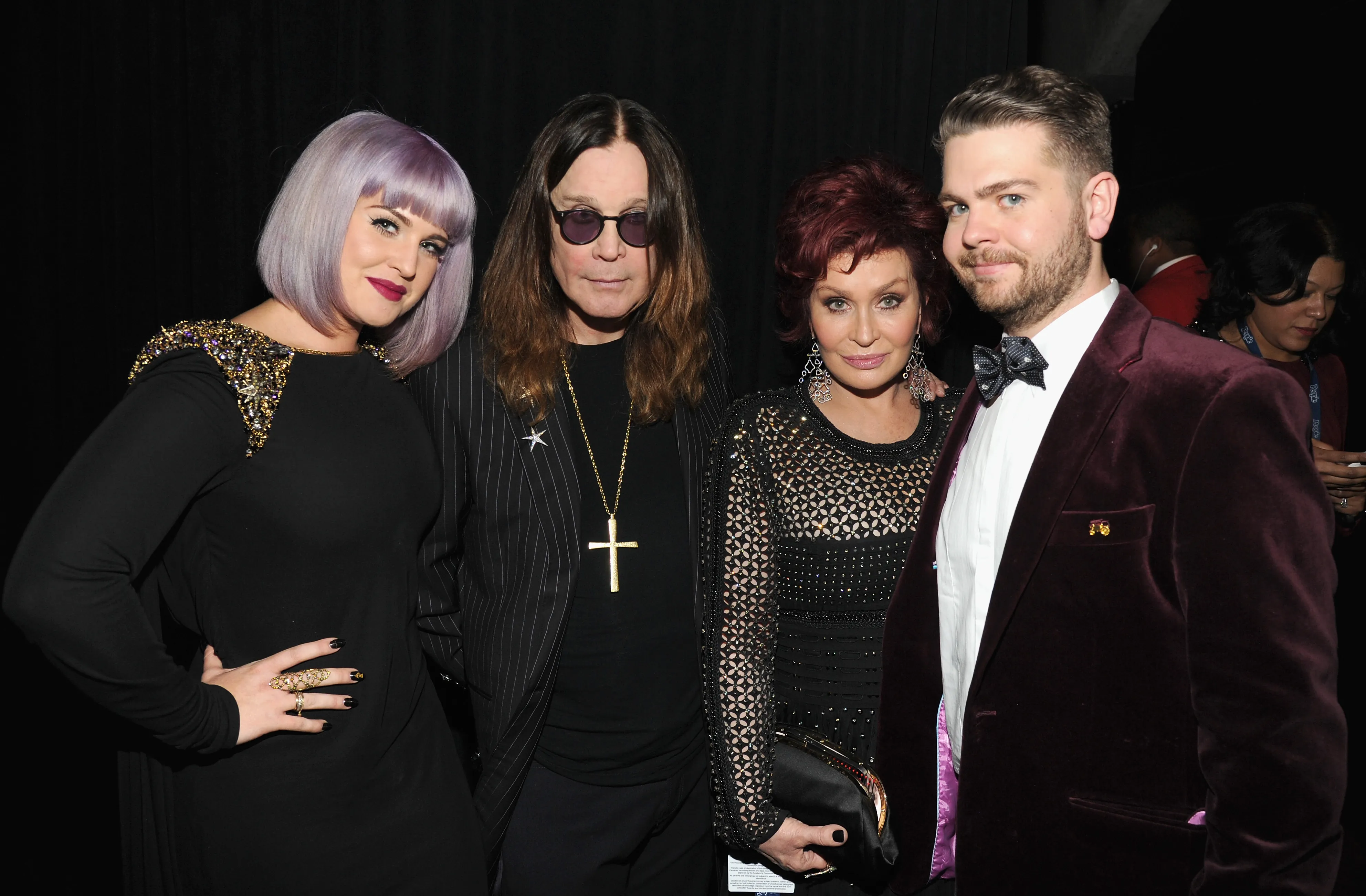 Kelly, Ozzy, Sharon, and Jack Osbourne at the 56th GRAMMY Awards.