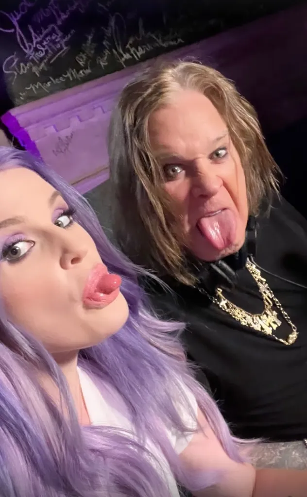 Kelly Osbourne and Ozzy Osbourne making funny faces.