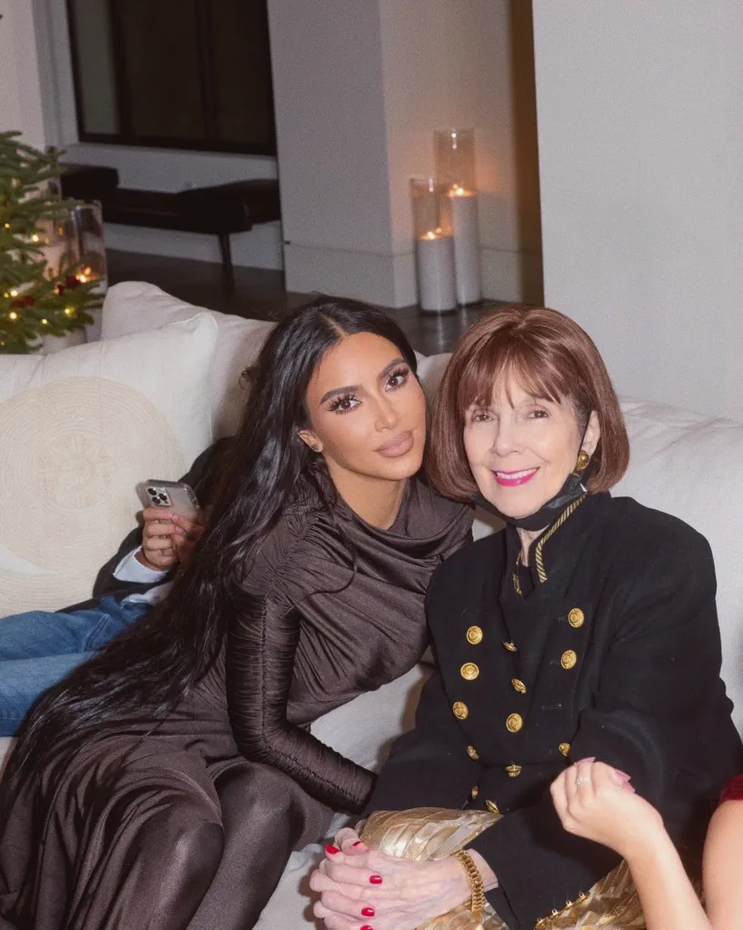 Kim Kardashian and her grandmother MJ sitting on a couch.