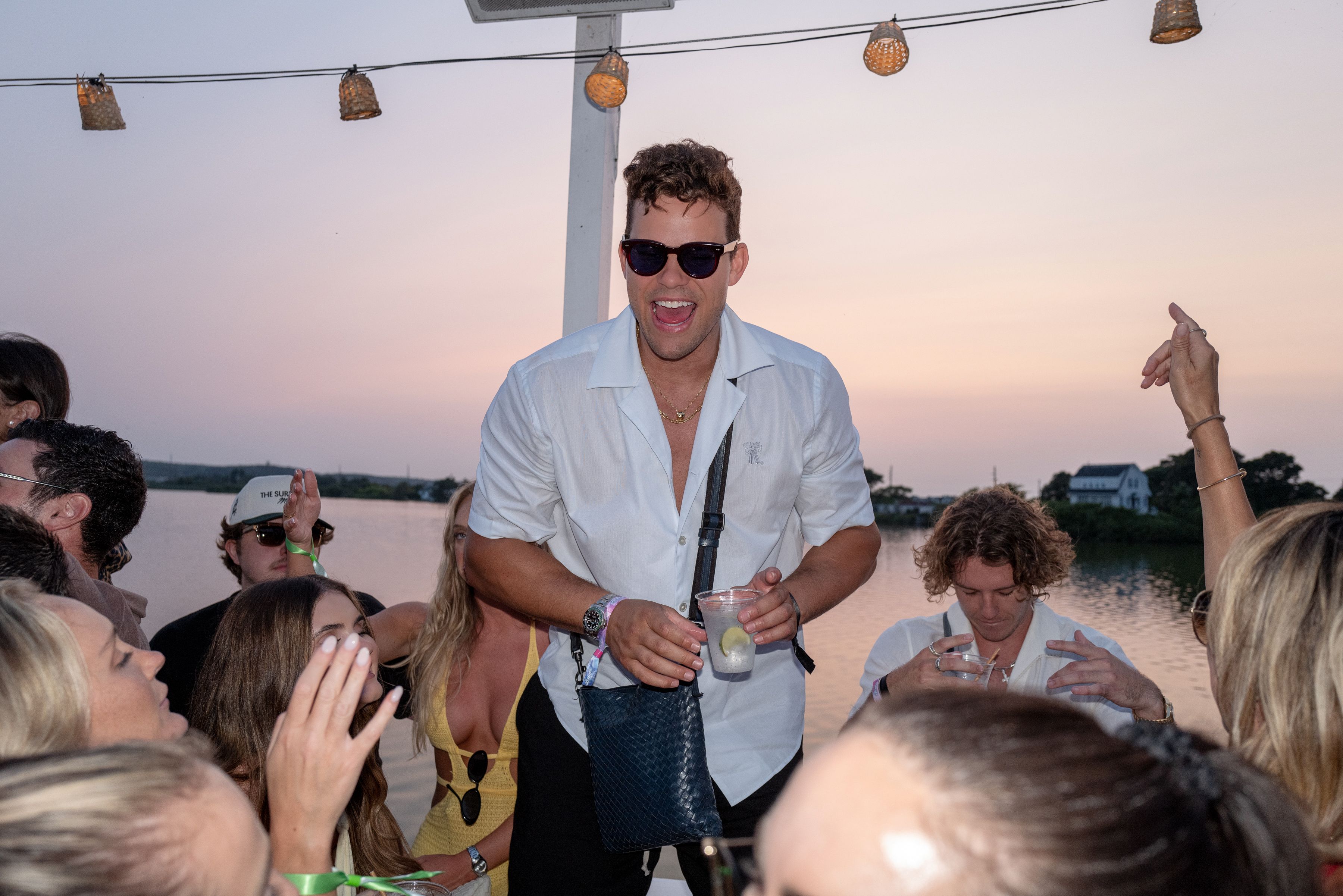 Kris Humphries smiling and laughing at The Surf Lodge.