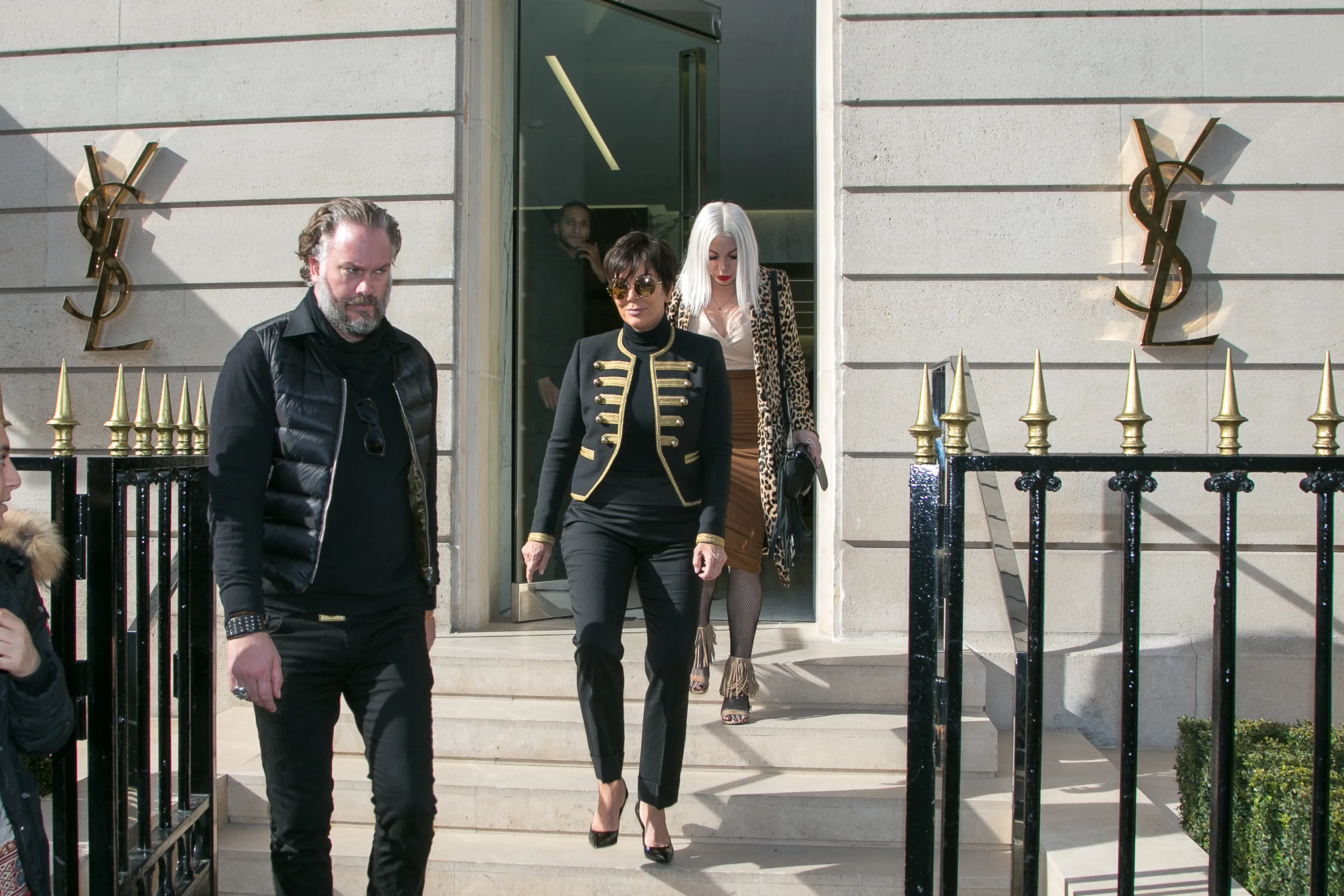 Kris Jenner and Joyce Bonelli leave the Yves Saint Laurent store.