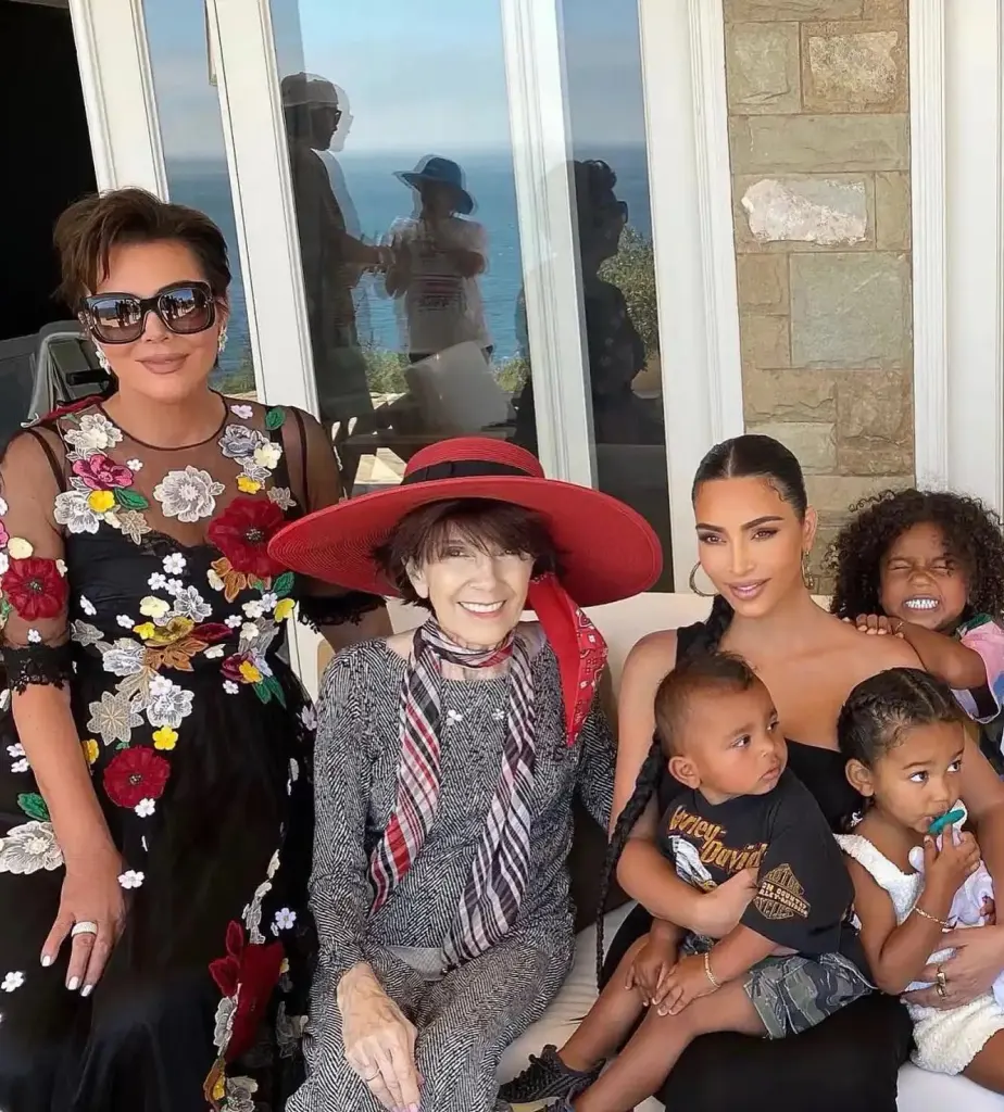 Kris Jenner, her mother Mary Jo Campbell, Kim Kardashian, and Kim's three youngest children pose together.