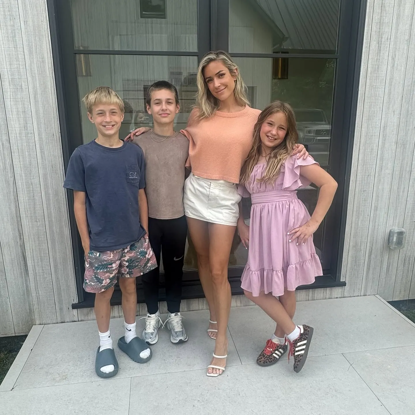 Kristin Cavallari posing with her three children.