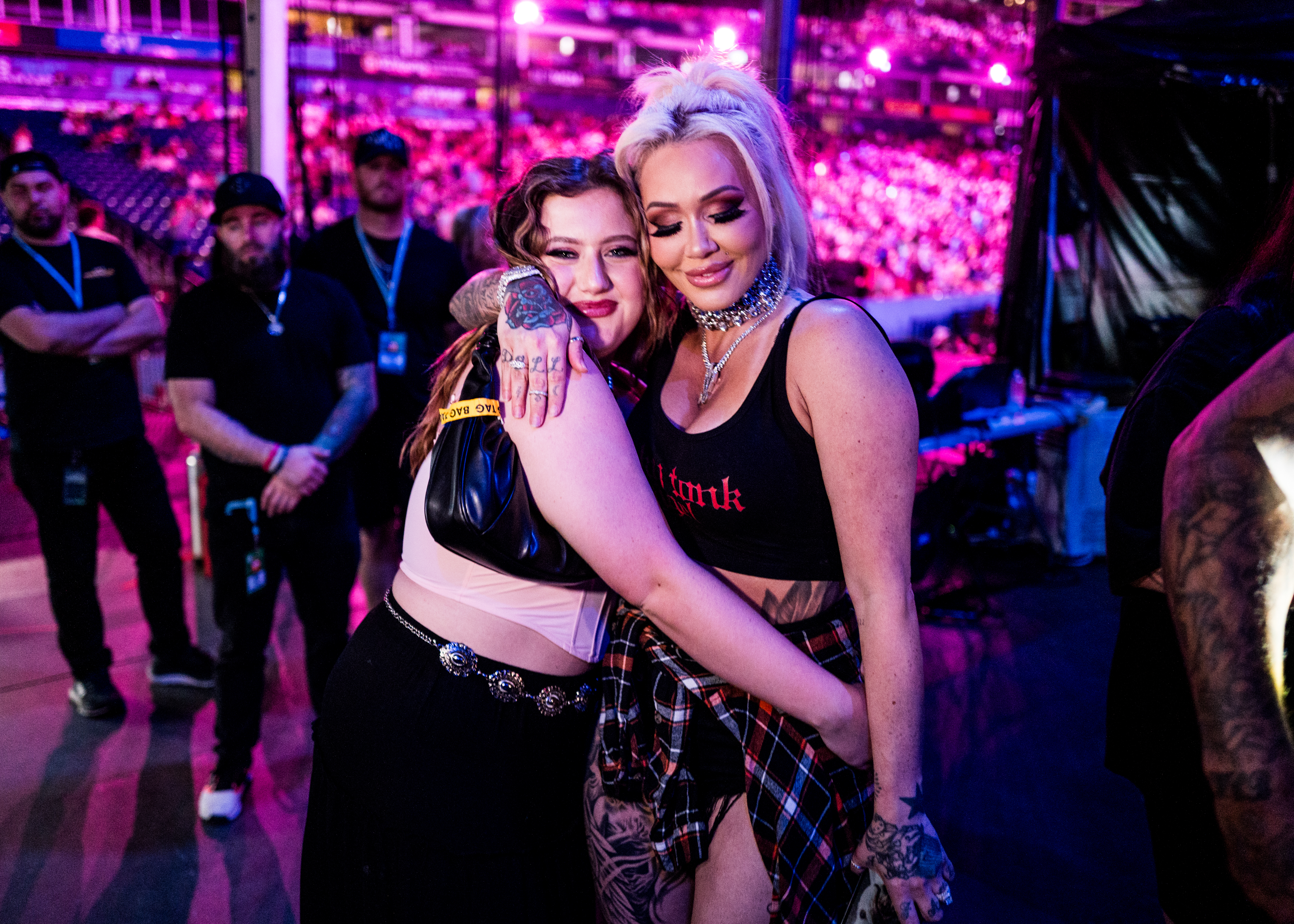 Bailee Ann and Bunnie Xo embracing at the 51st CMA Fest.