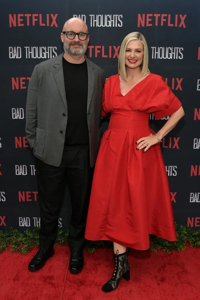 Tom Segura and Christina Pazsitzky posing on the red carpet at the premiere of Segura's Netflix Series 'Bad Thoughts.'