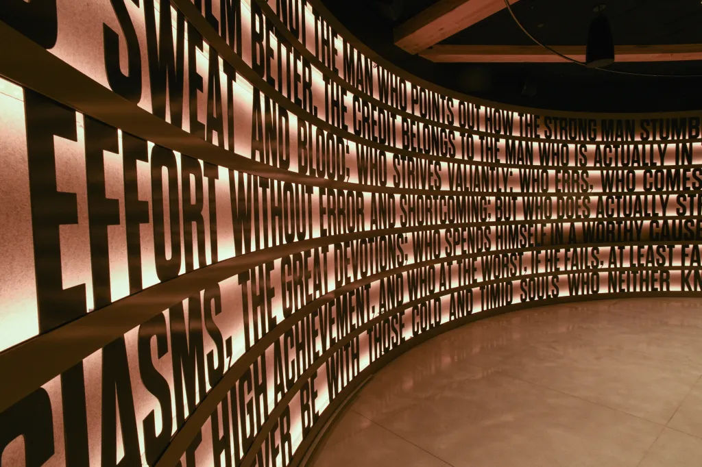 Backlit display of a quote from Theodore Roosevelt's 