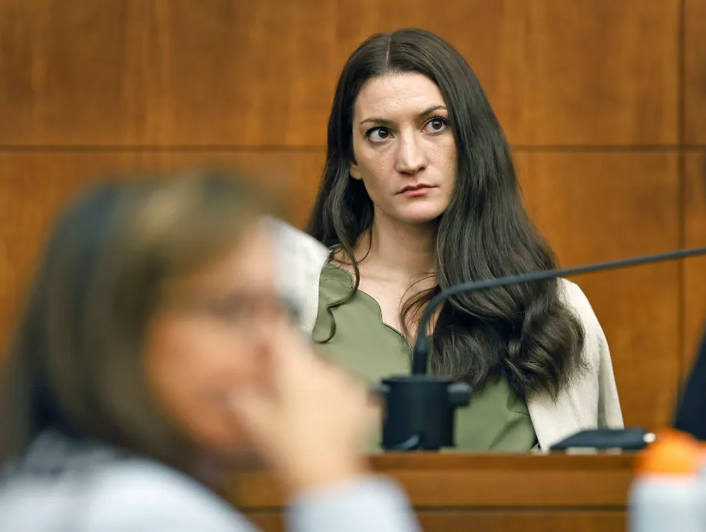 Lindsay Clancy waits for Judge William Sullivan to call a prospective jury member into court on day three of jury selection in her triple murder trial.