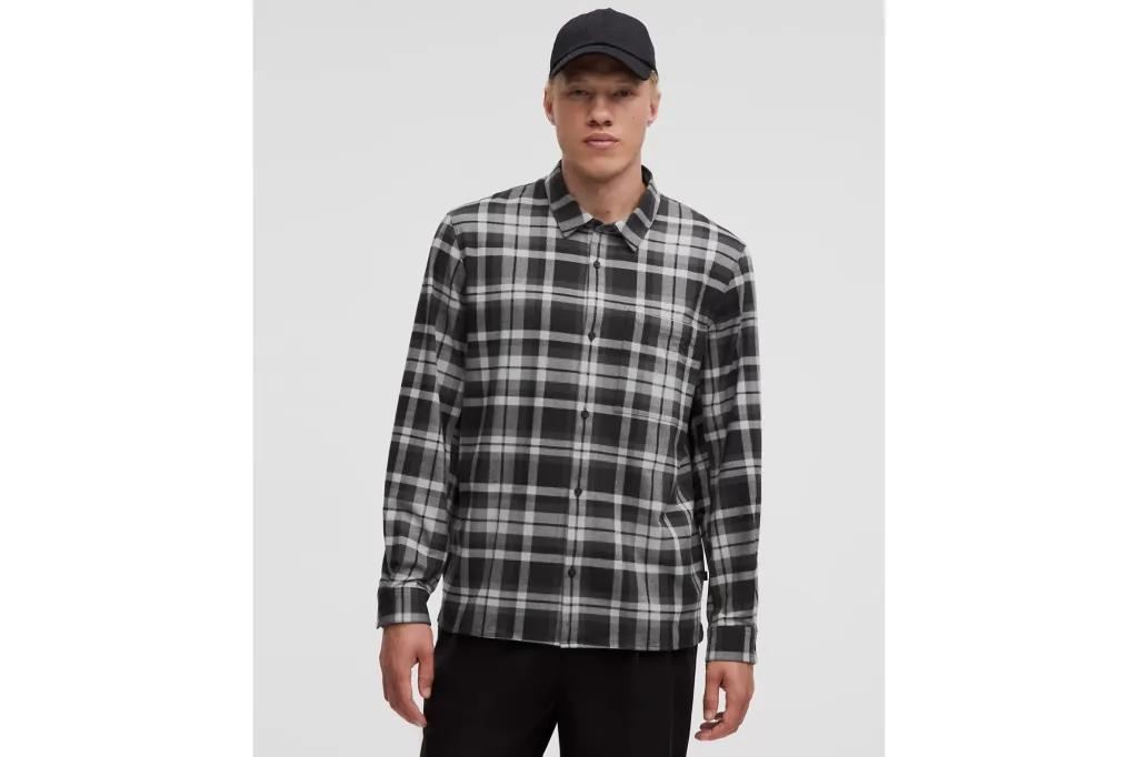 A man in a plaid shirt.