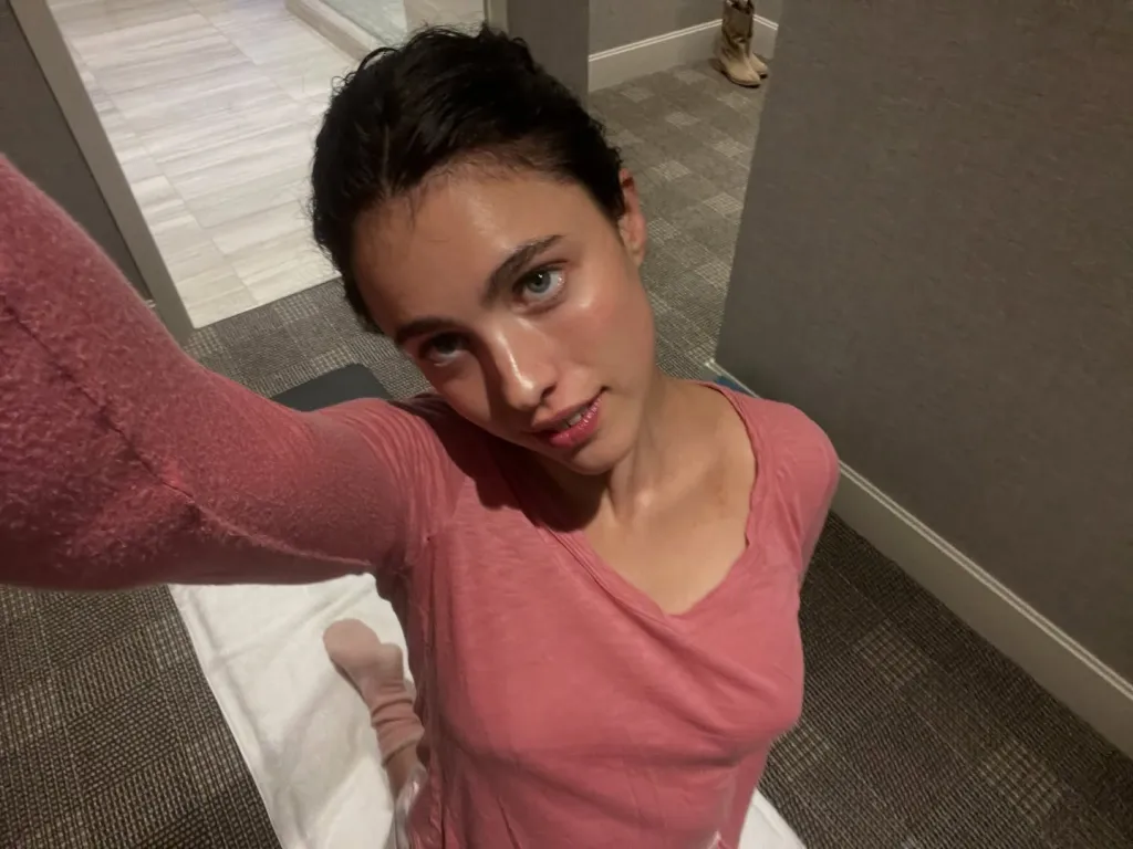 Margaret Qualley taking a selfie.