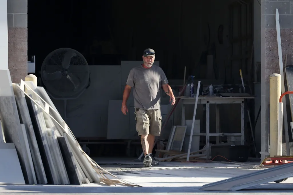 Tyler Robinson's dad Matthew Robinson at his masonry warehouse in St. George, UT.