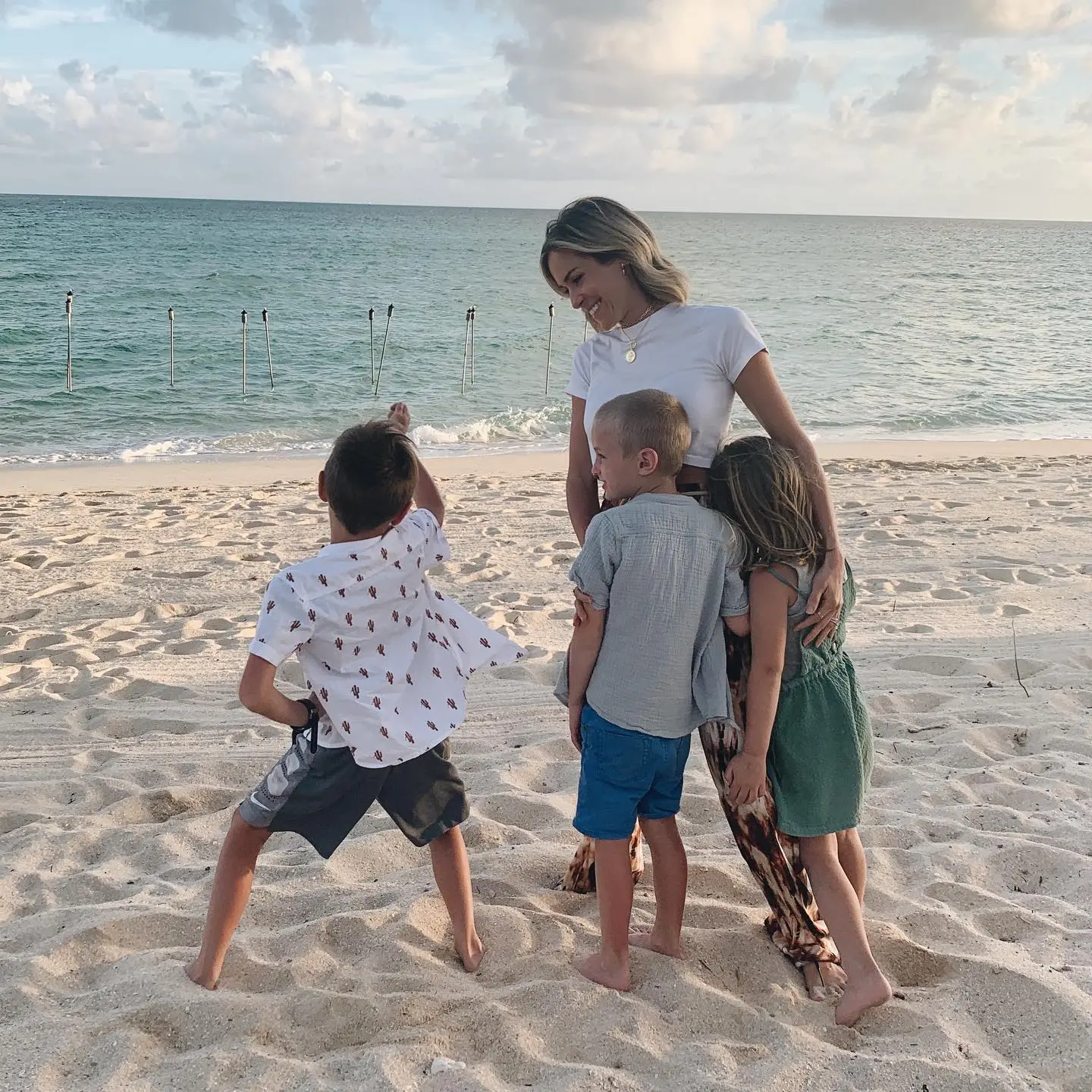 Kristin Cavallari on the beach with her three children.