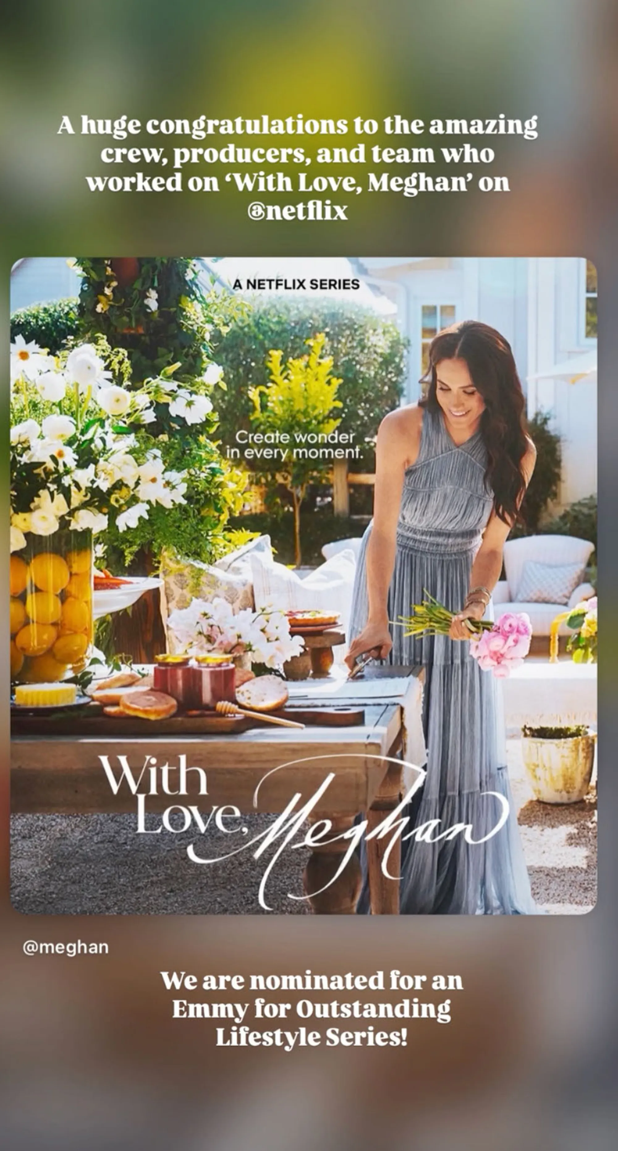 Meghan Markle stands at a table set with flowers and food, holding a bouquet, with text overlay congratulating the crew of "With Love, Meghan" for an Emmy nomination.