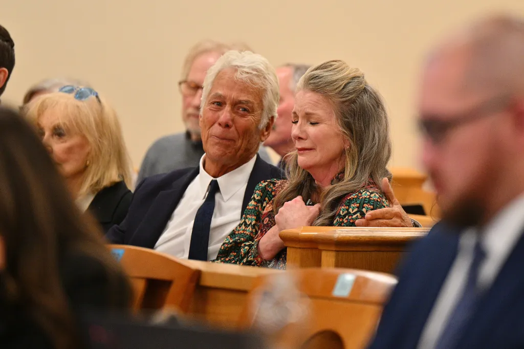Attorney Larry Stein and Melissa Gilbert reacting at a court hearing.