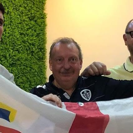 Michael Hewitt, an England fan, pictured behind an England flag.