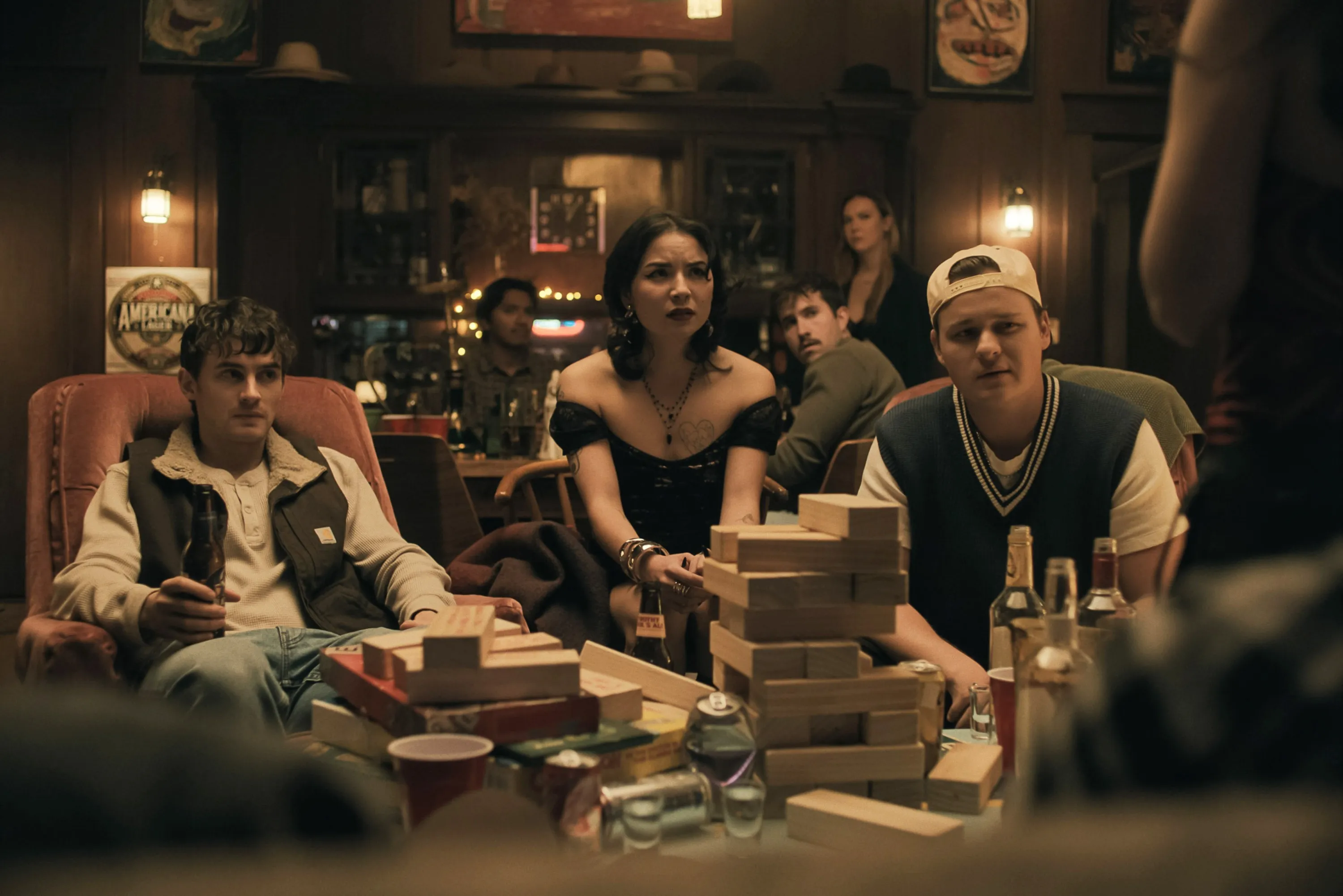 OBSESSION, from left: Michael Johnston, Megan Lawless, Cooper Tomlinson, 2025. © Focus Features /Courtesy Everett Collection