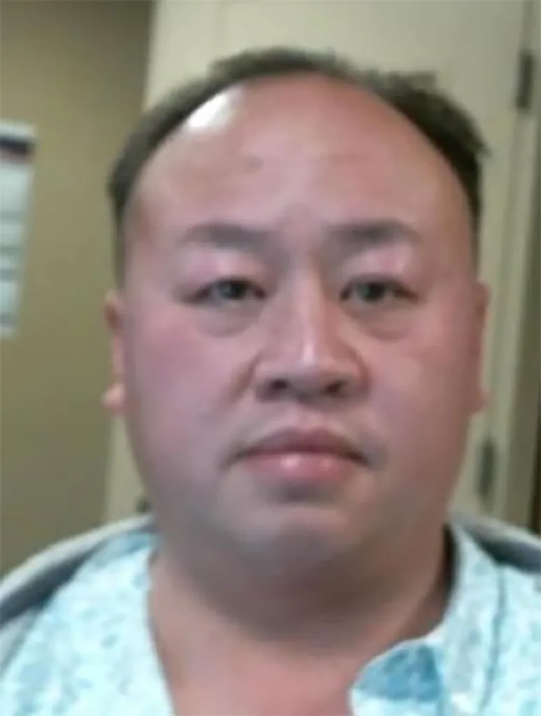Tou Lue Vang, who was pardoned despite his conviction for sexually assaulting a young girl.