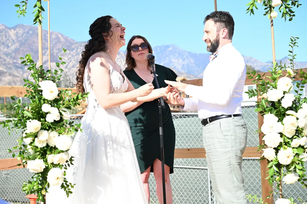Morgan Soloway and Kenny Rotter exchanging vows at their wedding ceremony.