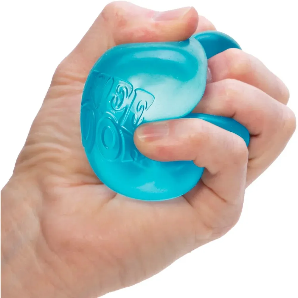 A person's hand squeezing a blue NeeDoh stress ball.