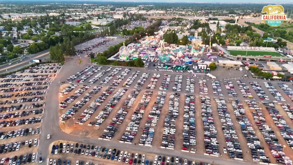 Aerial view of California State Fair with a crowded parking lot.