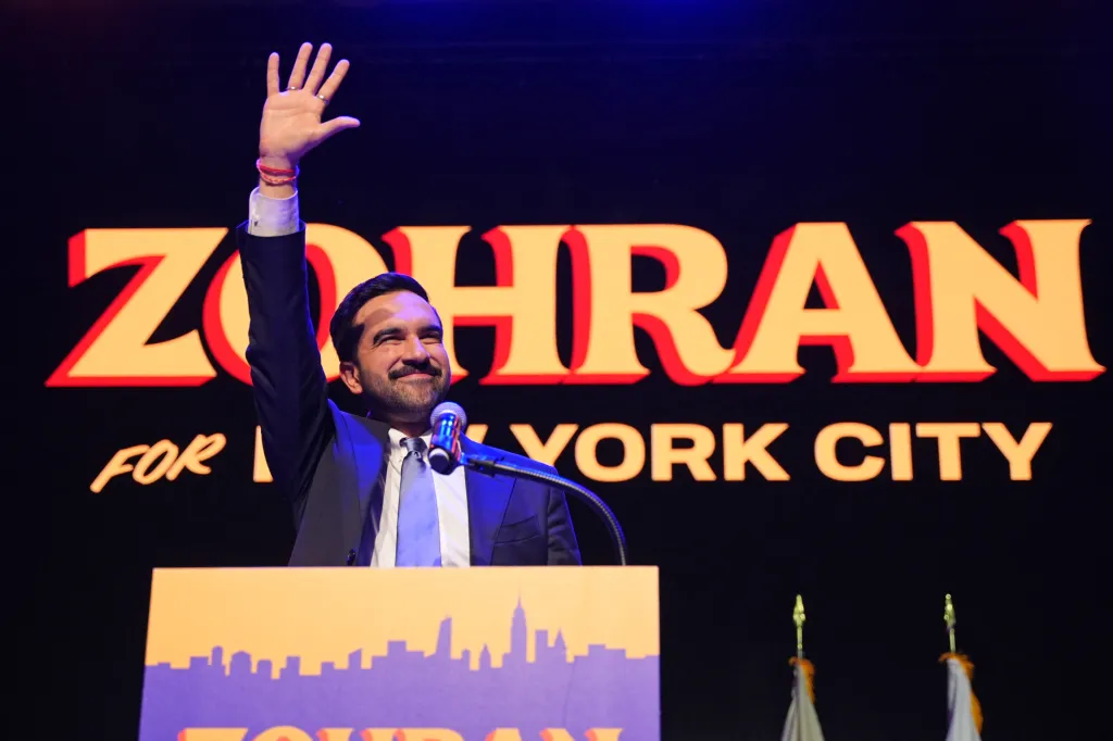 Zohran Mamdani waves to the crowd