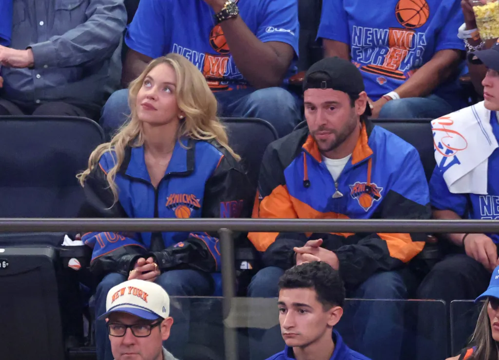 Sydney Sweeney and Scooter Braun at an NBA game at Madison Square Garden.