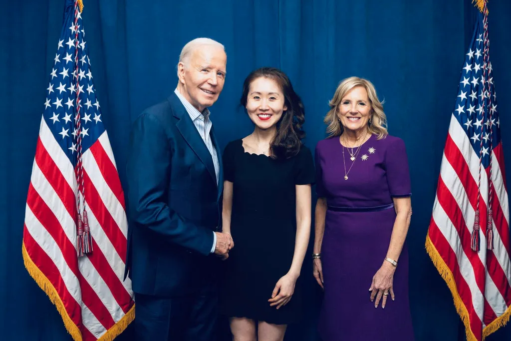 Lindy Li with President Joe Biden and first lady Jill Biden during a campaign event.