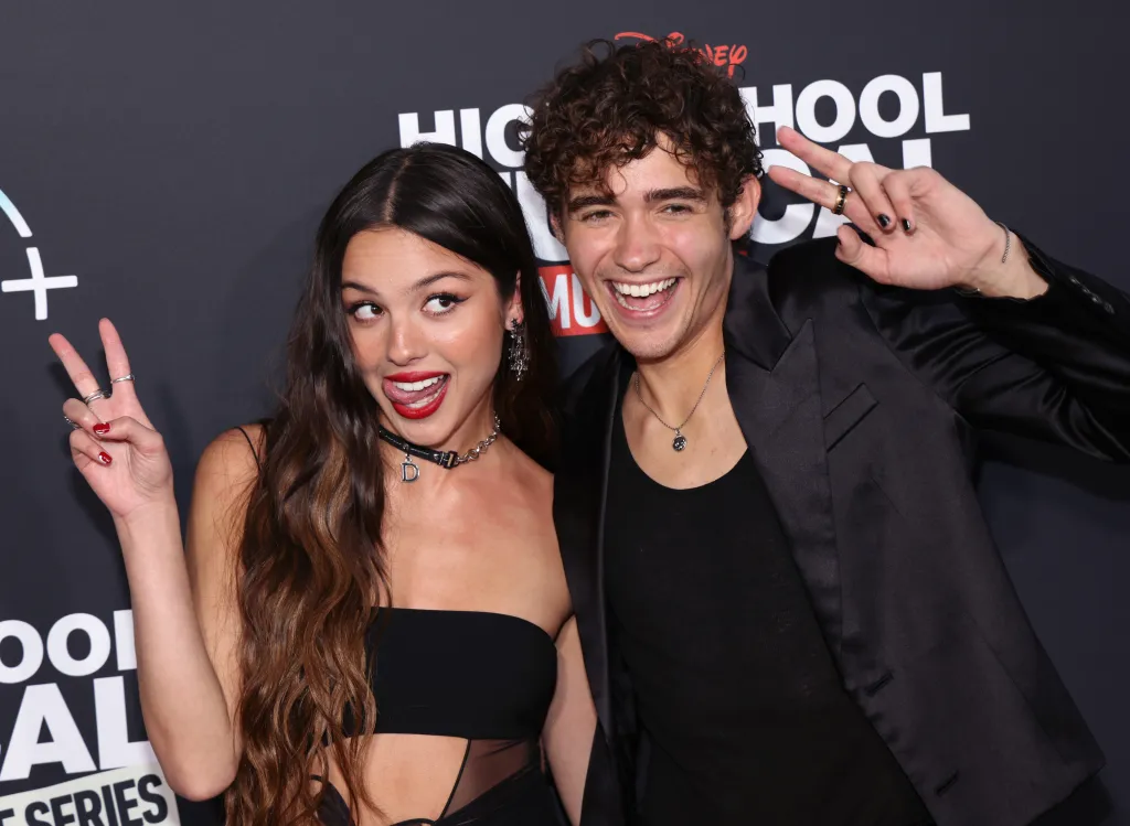 Olivia Rodrigo and Joshua Bassett posing for a photo.