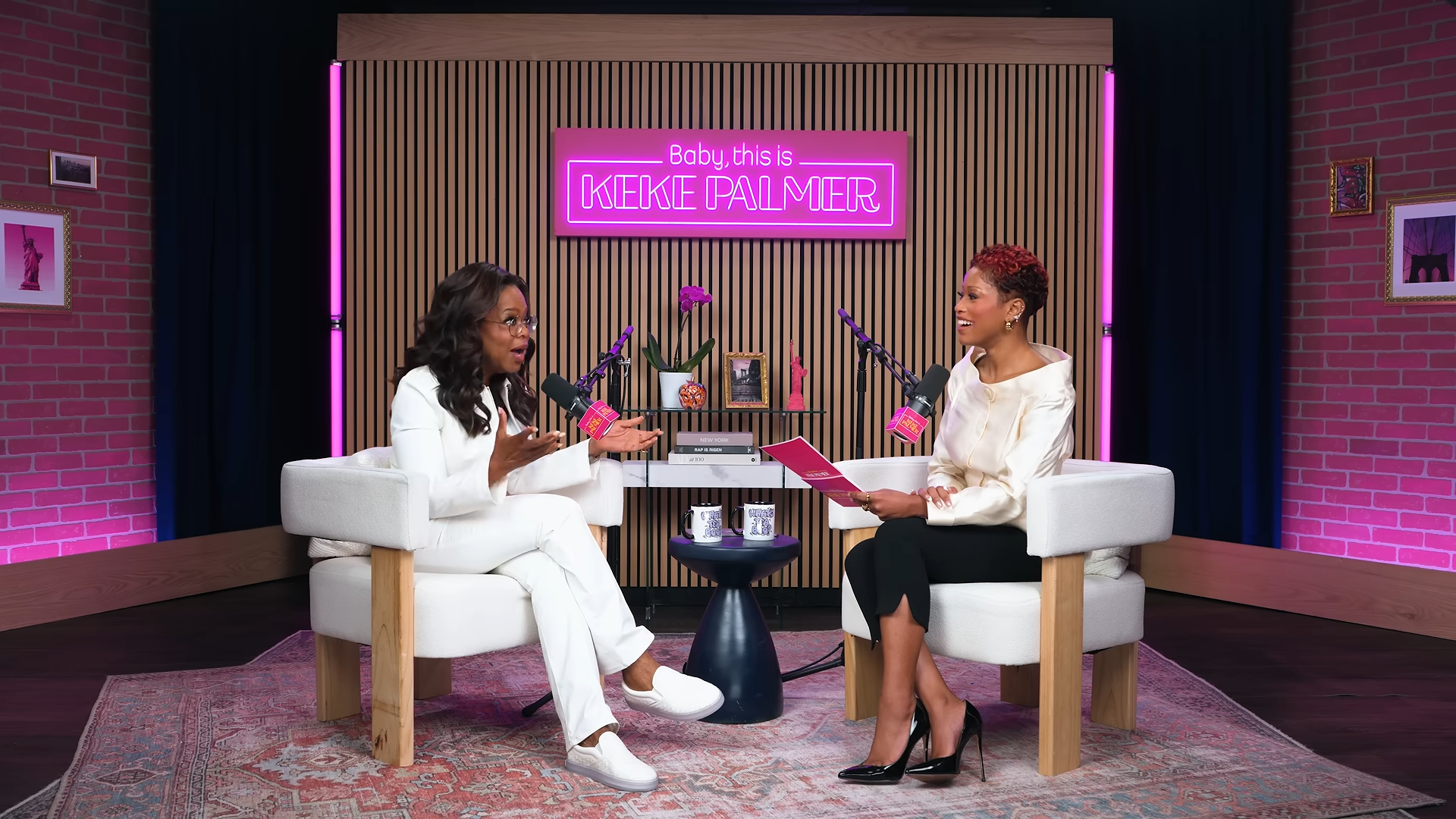 Oprah Winfrey talking to Keke Palmer during an interview.