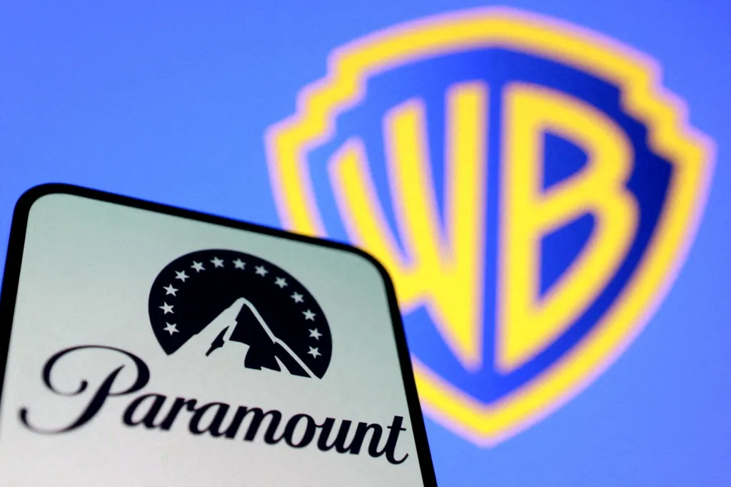 Illustration of the Paramount logo on a phone screen and the Warner Bros. logo in the background.