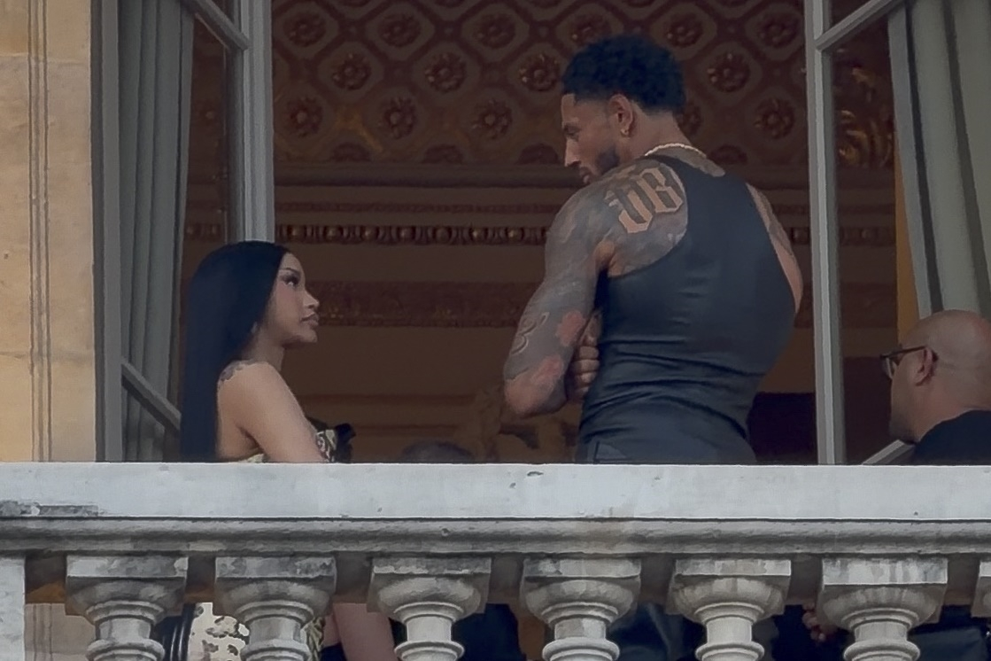 Cardi B and Maduka Okoye on a terrace in Paris.