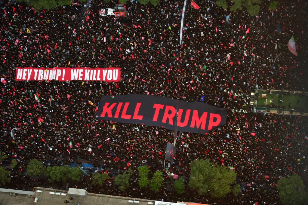 Iranians hold up signs calling to kill Donald Trump during the funeral of Iranian Supreme Leader Ali Khamenei in Mashhad, Iran, on July 9, 2026. 